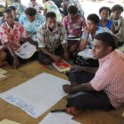 WCS staff working with Kubulau community members to adapt their management plan WCS staff working with Kubulau community members to adapt their management plan